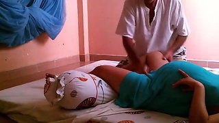 Pregnant woman getting leg massage