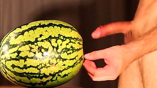 Muscular Stud Fucks and Cums on Watermelon