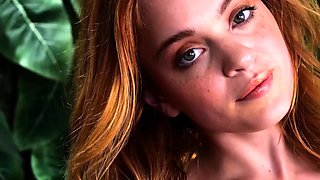 Stunning big tits redhead babe posing