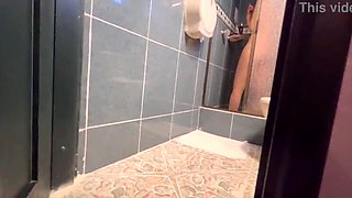 I capture the blonde slut from work masturbating in the restroom.