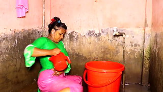 Sexi village bhabi take open bath.