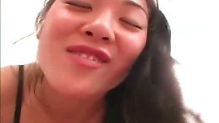 Nasty Asian slut smoking while sucking dick and in fishnet
