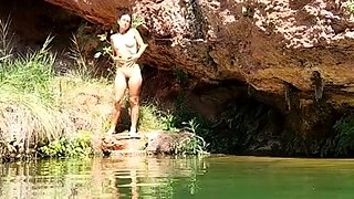 Wild girl posing naked and playing with herself outdoors