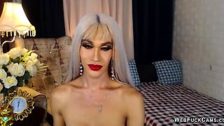 Asian trans cums in her hand on solo webcam show