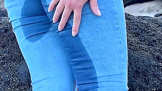 Peeing in Tight Jeans on the Beach