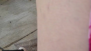 MILF playing outside on the front porch in plain view of the street and neighbors