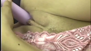 Trampy young brunette Nevaeh Ashton holds vibrator to her clit then shoves it in her shaved cunt