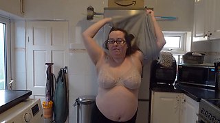 Mom with massive tits strips down in the kitchen