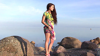Solo masturbation on the riverbank from the cute Norma A