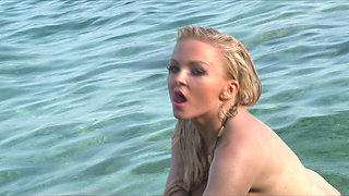 Blonde Babe Fingers Pussy on Rocky Beach to Orgasm