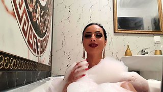 Sexy leggy brunette enjoys foot fetish