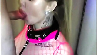 Submissive wife on a leash sucks dick until he cums on her face and tits