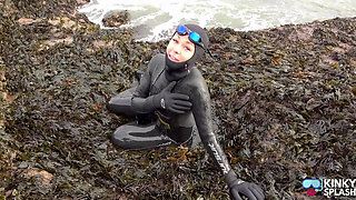 Rubbery Beach Encounter: Lucy's Neoprene Pussy Play with Stranger