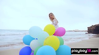 Sexy naked MILF playing with her baloons