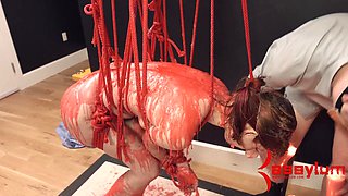 Waxed and flogged BDSM anal teen