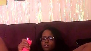 Dorothy Black and Britney use the toy