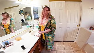 The blonde woman is on her knees and ready to suck