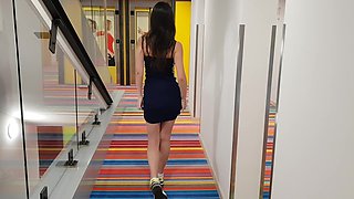 Girl Walks Down the Hall and Shows Her Ass.