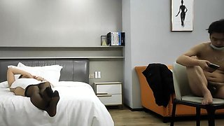 Cute amateur asian web cam girl playing with her toy