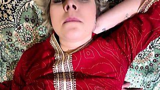 A Turkish woman, married, of mature age, engaging in