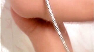 Angel with natural tits Merilyn Sakova poses topless in the bathroom