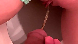 Piss on Her Pussy Lips While Shes Also Peeing on the Toilet