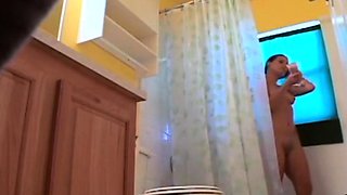 Stepdaughter 21 shaves pussy in shower (voyeur)
