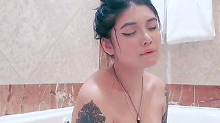 Busty babe playing with her big boobs