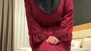 Fatima dancing in hotel room